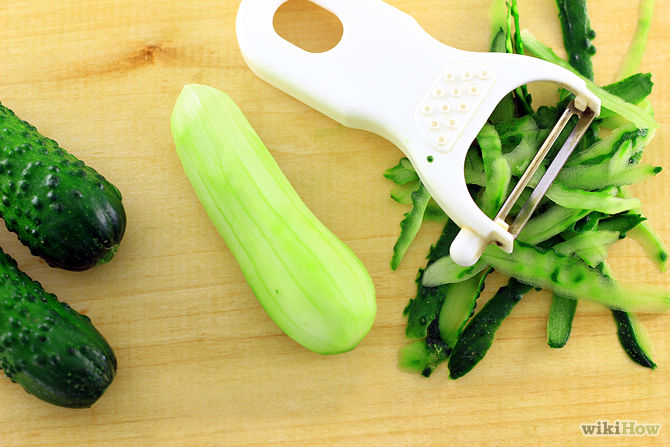 1. Peel your cucumbers. The skin of a cucumber is coated in a protective wax. While you can eat this coating without much problem, the wax will distort the texture of cucumber juice. You can accomplish this task by using either a potato peeler or a sharp knife with a smooth blade.