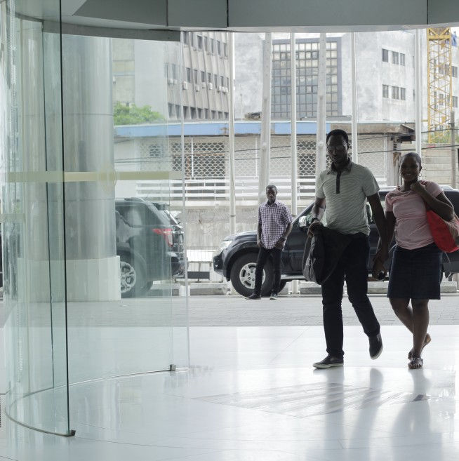 After a long ride, they arrive at the Intercontinental Hotel, Lagos.
